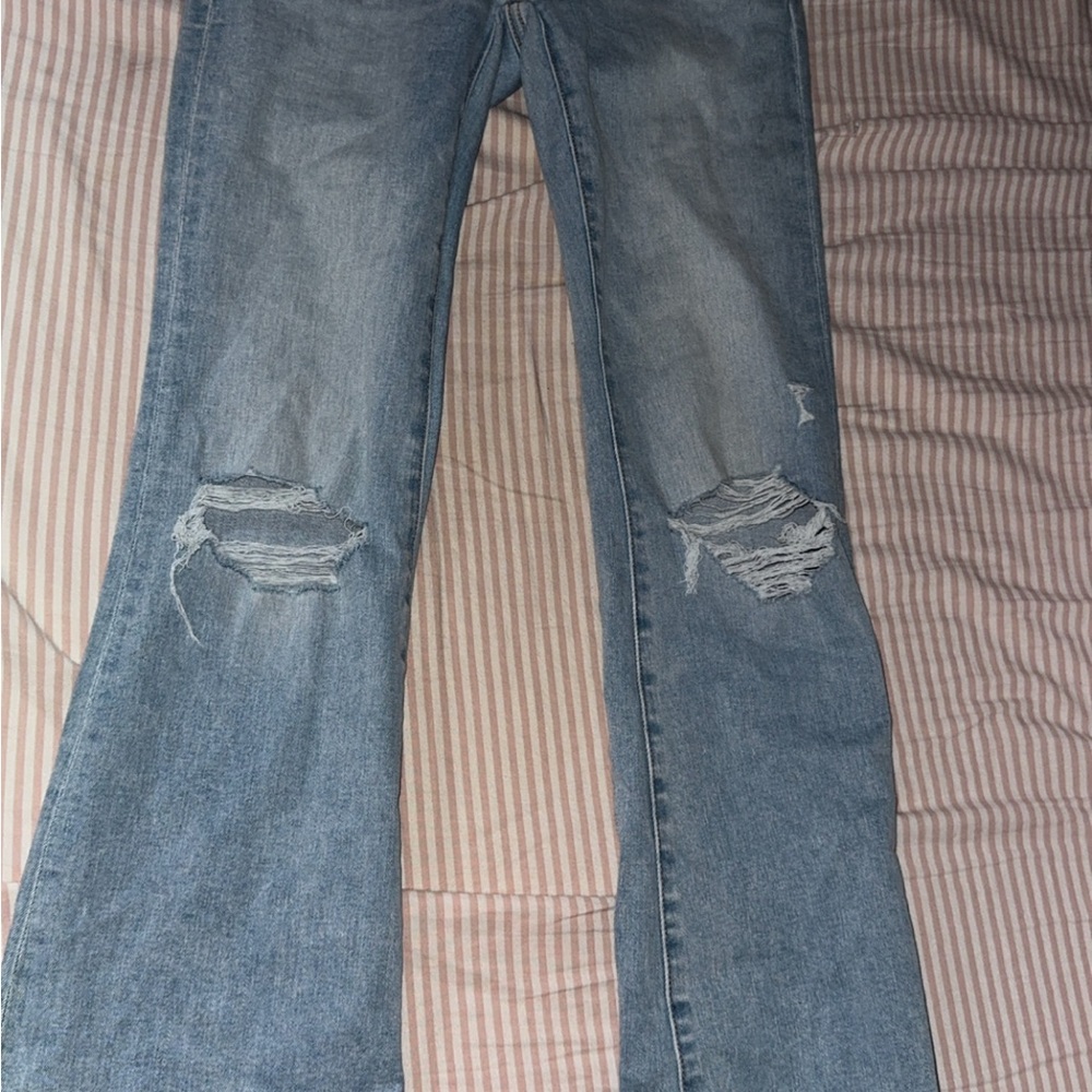 Distressed Blue Jeans
